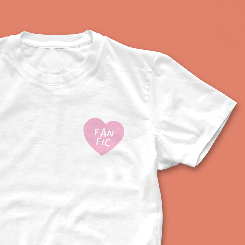 Fan Fic T-shirt with small pink heart and hand-drawn lettering, designed for fanfiction lovers and bookish readers
