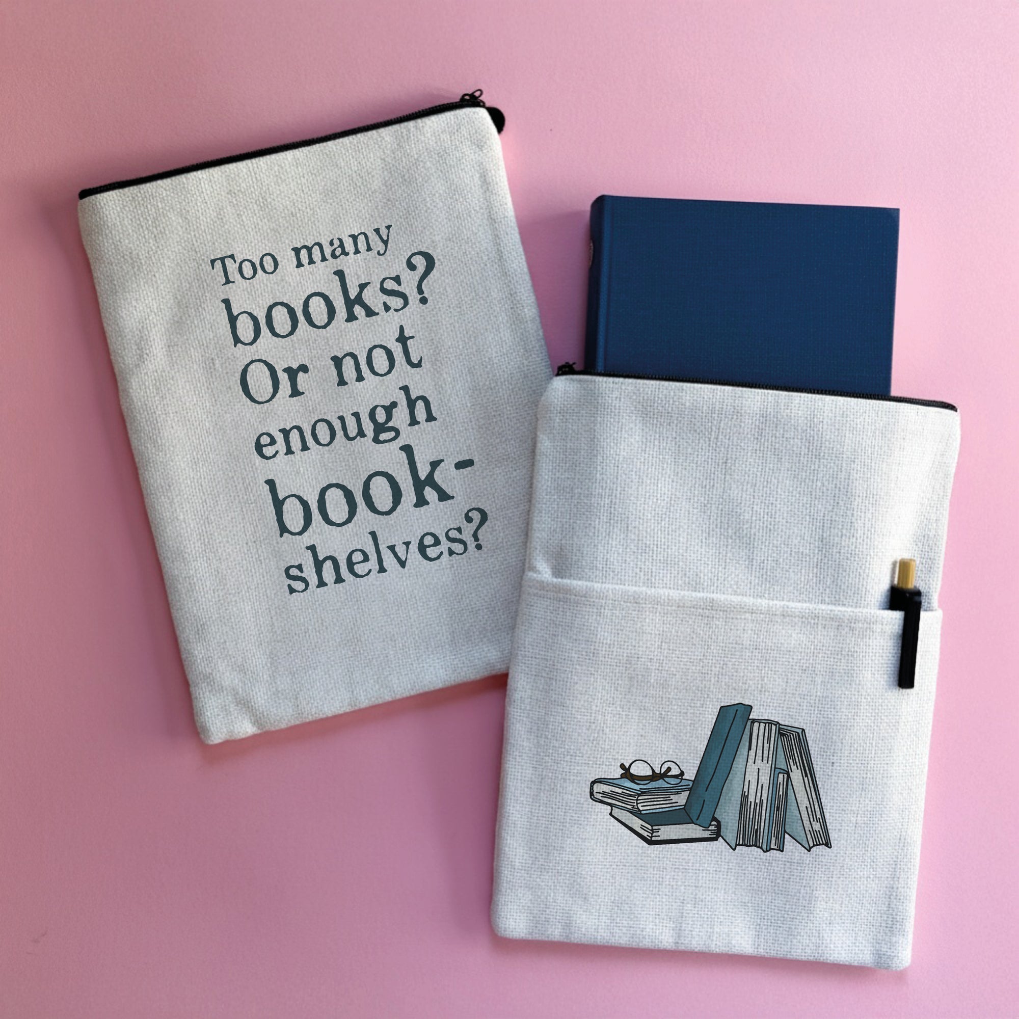Too Many Books book sleeve holding a hardback book, shown on pink background