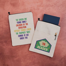 Double-sided YA Reader book sleeve with merit patch design on one side and rainbow YA tropes list on the other.