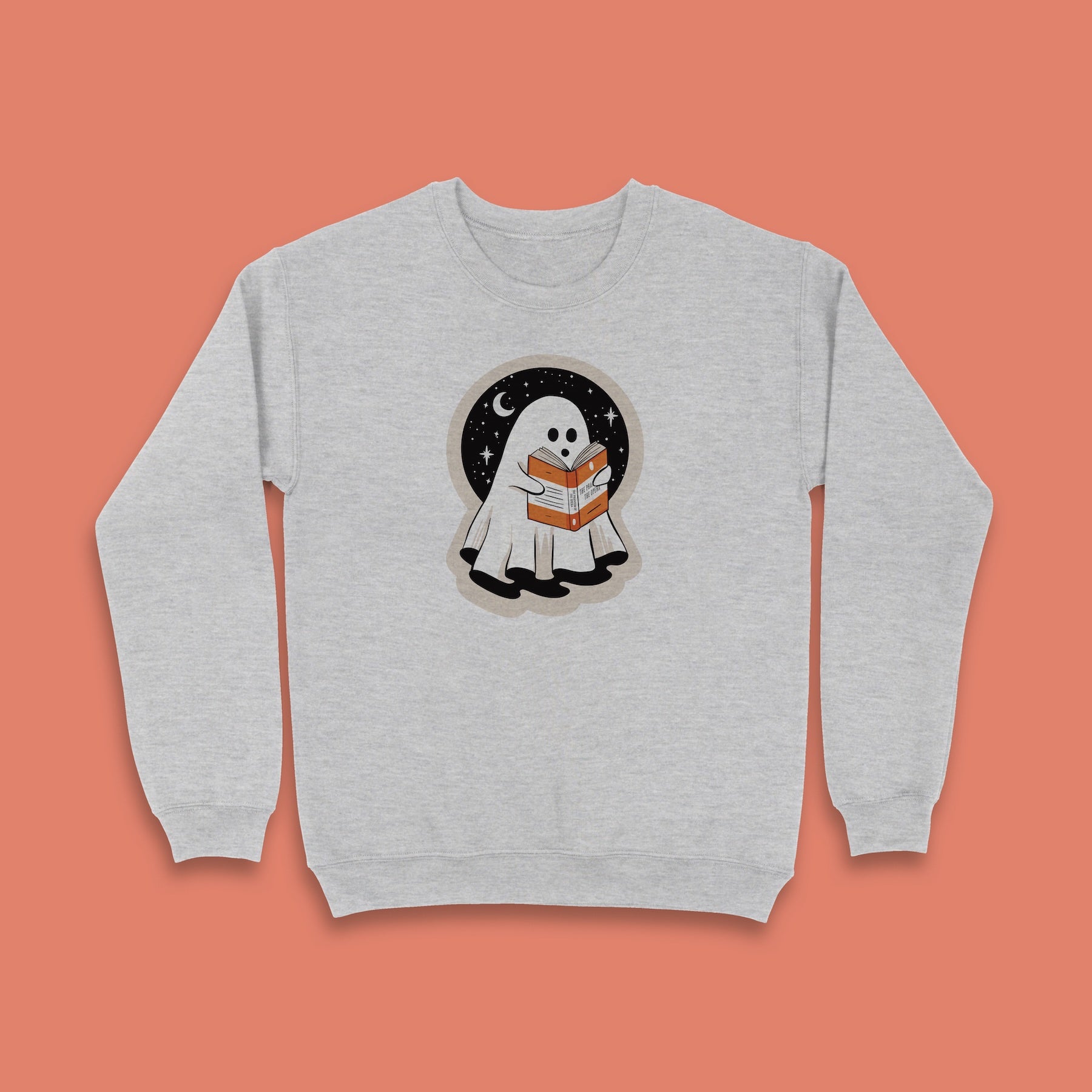 Grey sweatshirt with a cute ghost reading a book under the stars, Halloween theme.