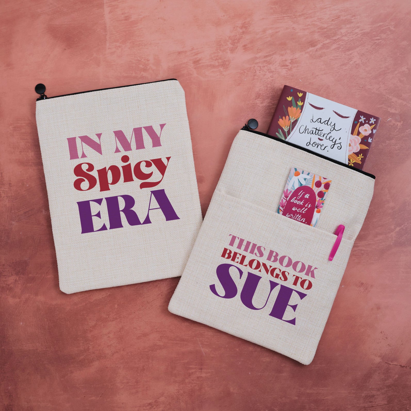 Personalised book sleeve featuring “In My Spicy Era” design on one side and “This Book Belongs To Sue” on the other.