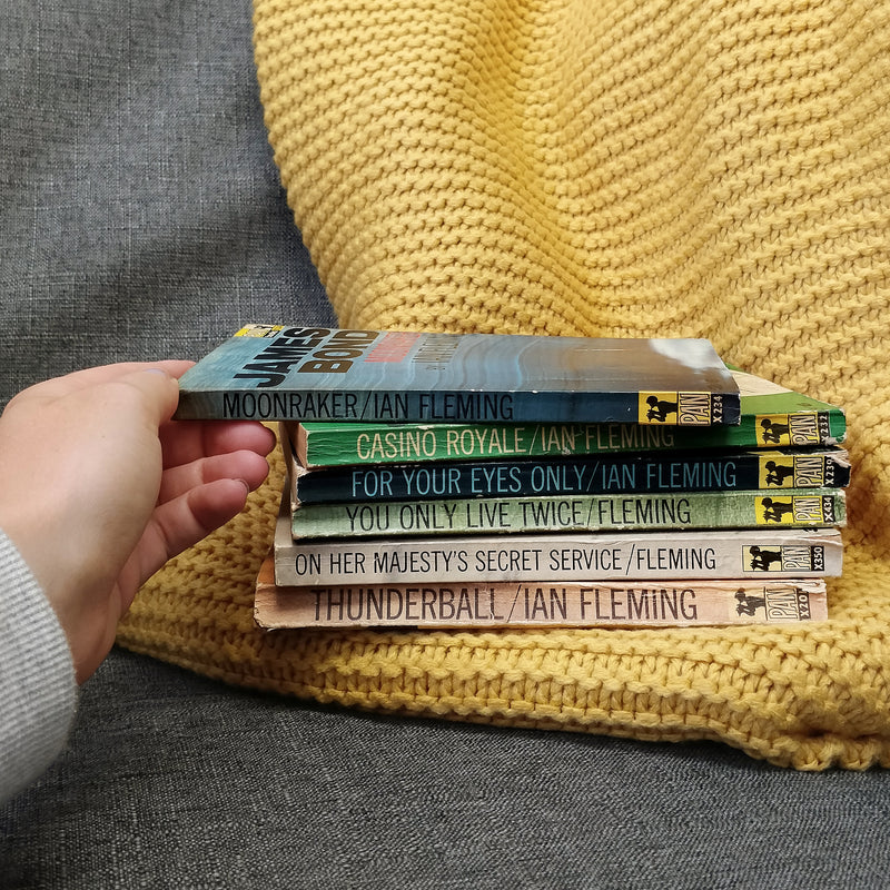 James Bond Mini Library. Bond Book Collectors. Vintage James Bond Books. Featuring Live and Let Die. Dr No. You only Live Twice. Thunderball. Action Books. Gifts for book lover, bookworm, reader and bibliophile. Bookishly.