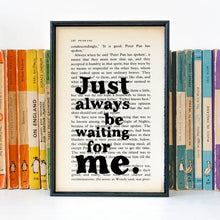 Framed book page print with the quote "Just always be waiting for me" from Peter Pan, surrounded by vintage Penguin books.