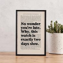 Framed quote print with “No wonder you’re late…” from Alice in Wonderland on a book page