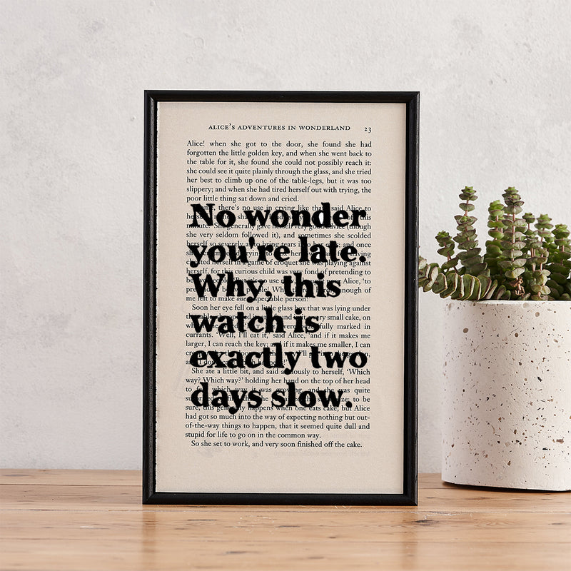 Framed quote print with “No wonder you’re late…” from Alice in Wonderland on a book page