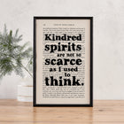 Framed book page print featuring the quote “Kindred spirits are not so scarce as I used to think” from Anne of Green Gables