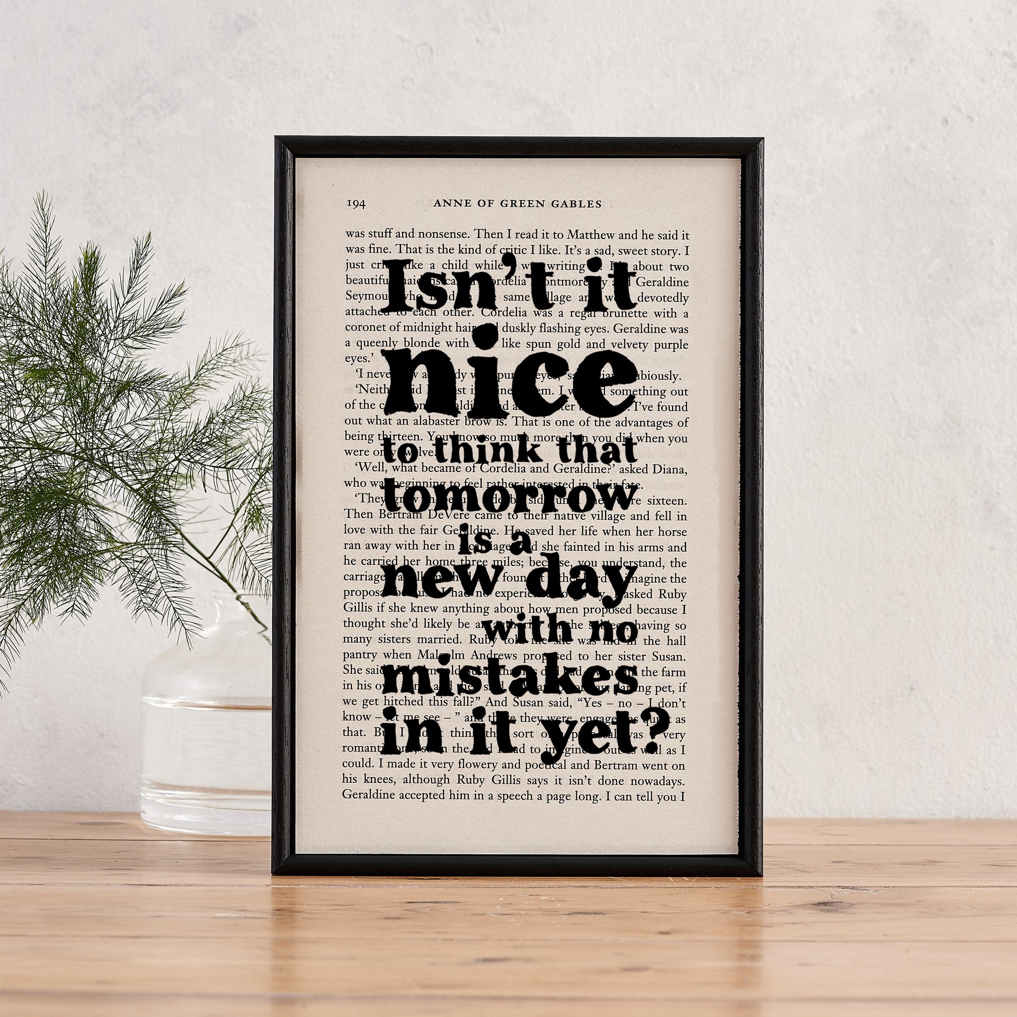 Framed book page print with the quote “Isn’t it nice to think that tomorrow is a new day with no mistakes in it yet?” from Anne of Green Gables.