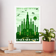 Emerald City fictional travel art print inspired by The Wizard of Oz, in green and gold tones with a vintage-style illustration of the Emerald City skyline