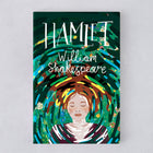 Illustrated edition of Shakespeare’s Hamlet featuring a modern Ophelia-inspired cover design with swirling water and flowers.