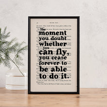 Framed book page print with the quote “The moment you doubt whether you can fly, you cease forever to be able to do it” from Peter Pan.