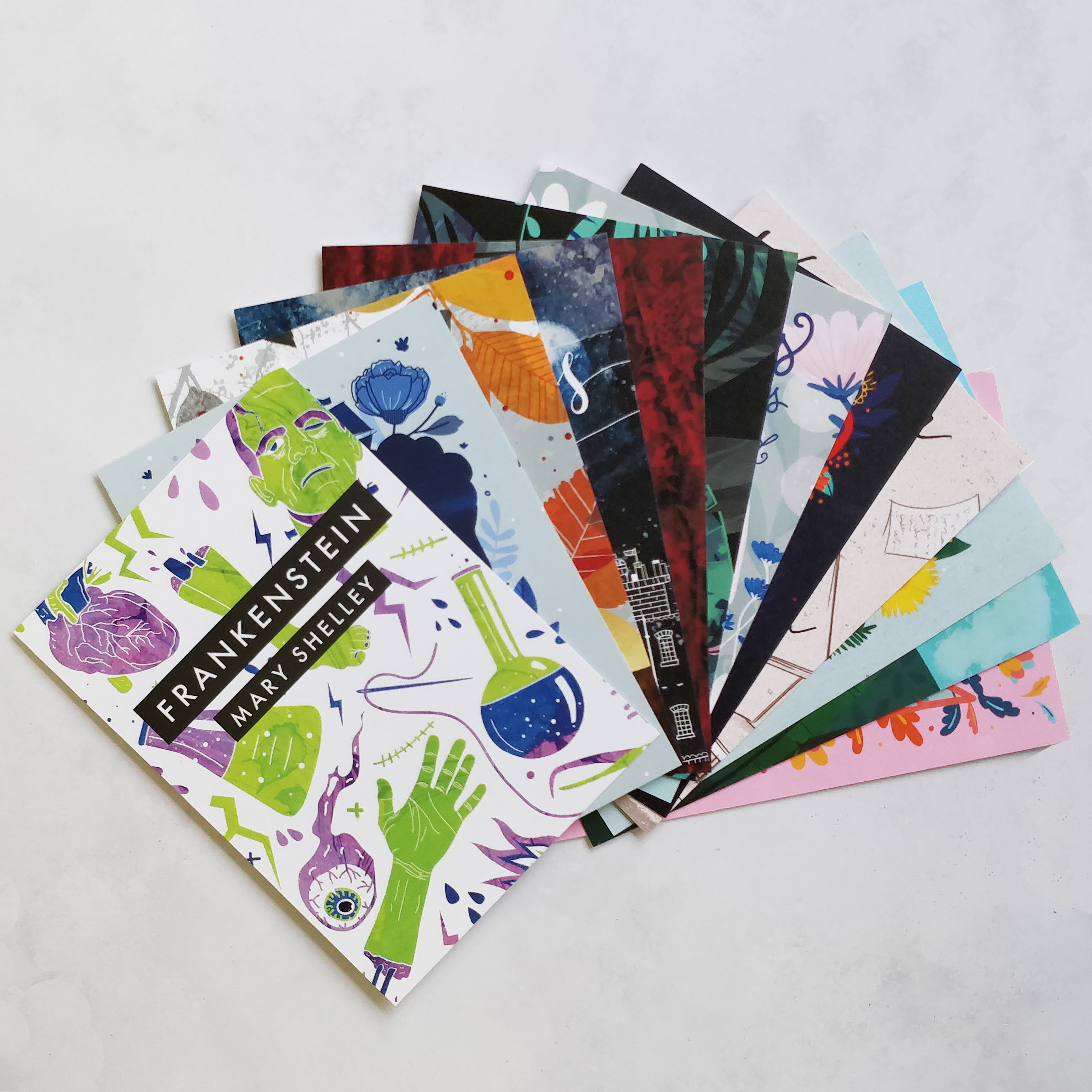Set of 12 Book Cover Postcards illustrated by Bookishly. Book lover postcards. Bookish Gifts. Pen pal. Snail mail. Sending a postcard. Love letters. Booktok. Bookstagram. Postcards for bookworms, bibliophiles, readers. Booktok lovers.