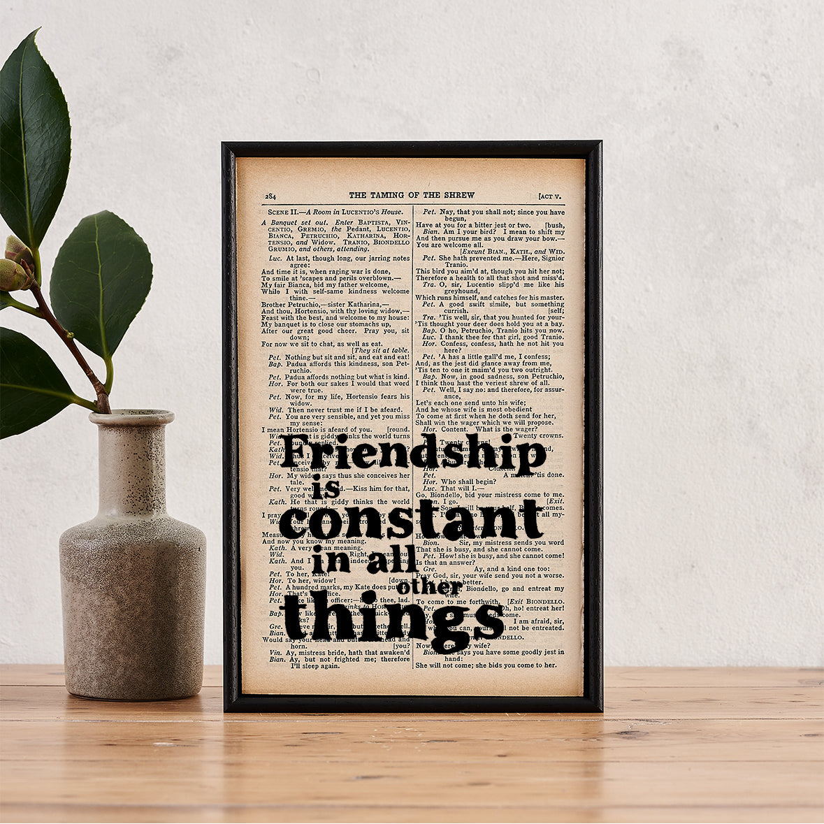 Framed book page print featuring the quote “Friendship is constant in all other things” from Shakespeare’s Much Ado About Nothing 