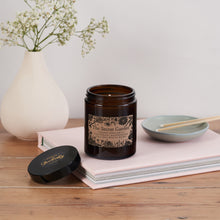 Luxury Vegan Candle. Soy wax Candle. Bookish Candle. Amber apothecary style jar. Apothecary. Hand Poured Signature Candle. Natural soy wax. Classic Literature. Reading Candle. Mary Lennox. The Secret Garden. Floral Candle. Florist. Gifts for Gardeners. Plants. Flowers. Frances Hodgson Burnett.